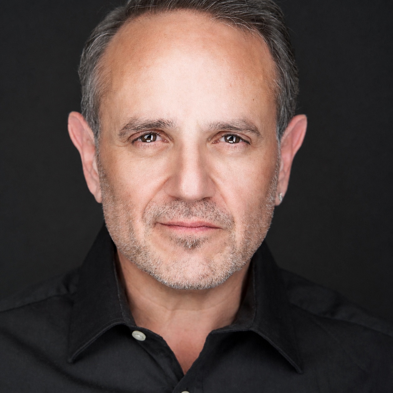 Professional portrait of Jim Honiotes